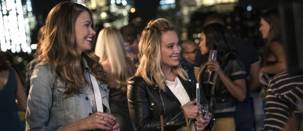 Sutton Foster, Hilary Duff, and Background Actors in Younger.