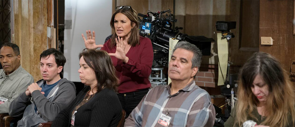 Director Mariska Hargitay and Background Actors.