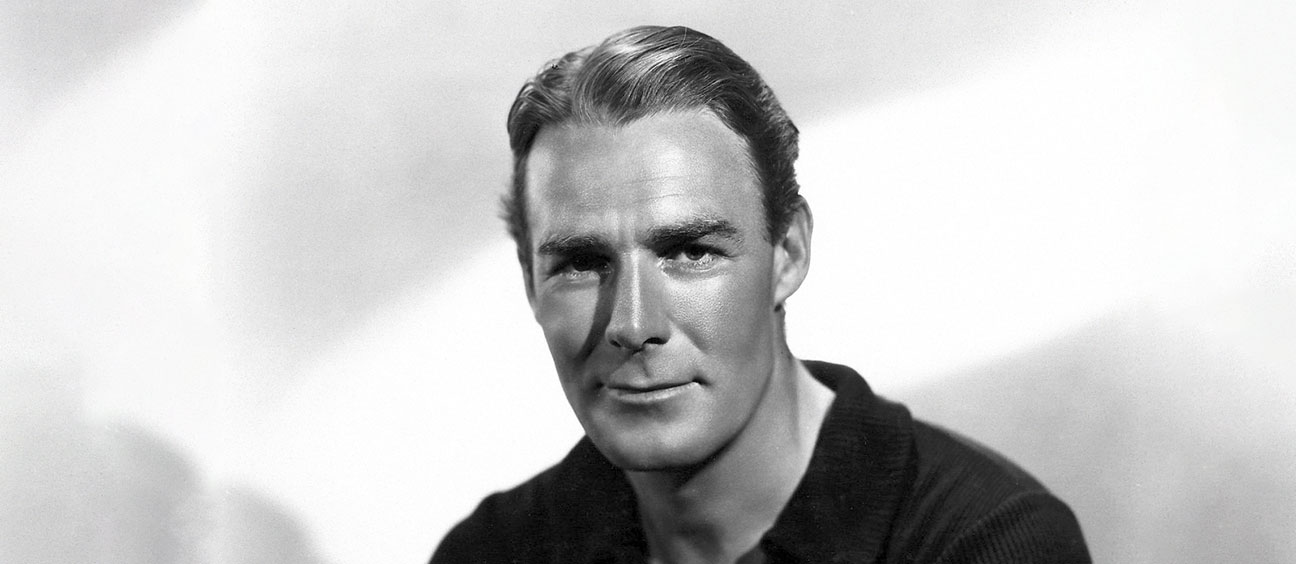 Actor Randolph Scott in a publicity headshot.